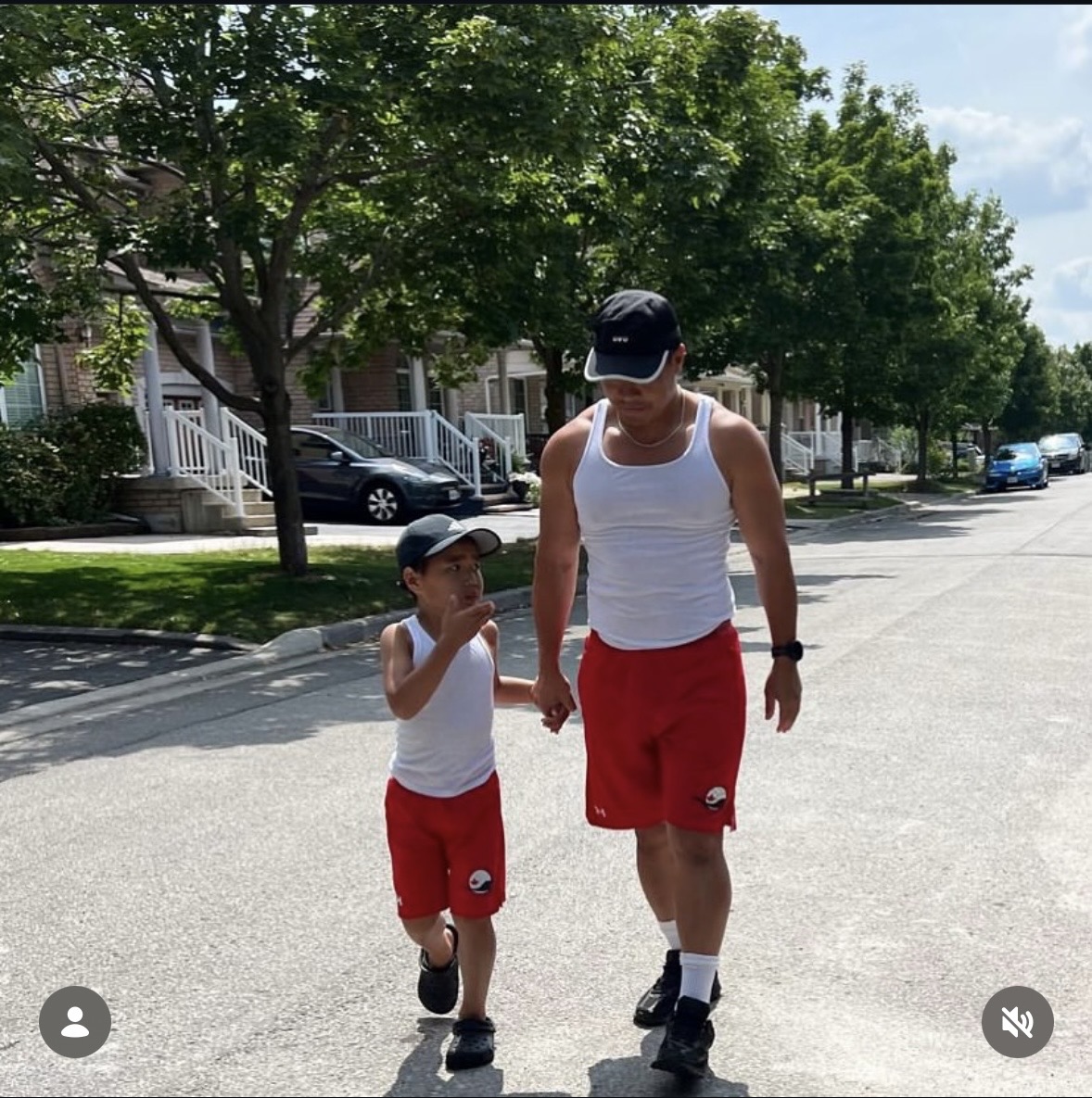 Daniel Nguyen walking with his child