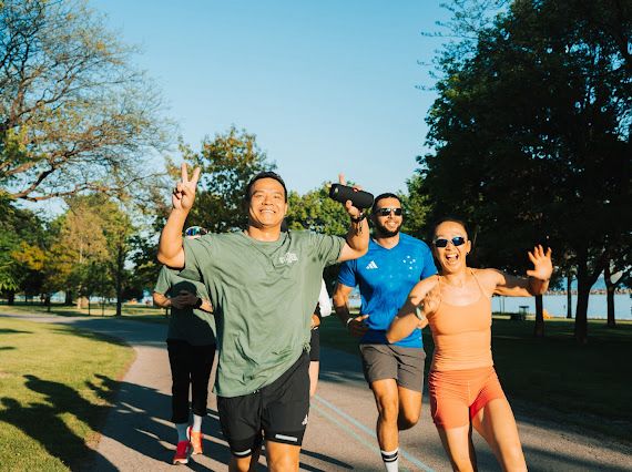 Daniel Nguyen running with a community group